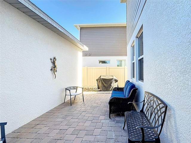 view of patio / terrace with fence