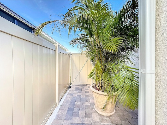 view of patio / terrace with a gate and fence