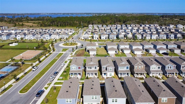 birds eye view of property with a residential view