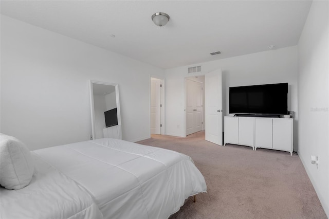 carpeted bedroom with visible vents