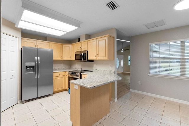 kitchen with light tile patterned floors, visible vents, light brown cabinetry, appliances with stainless steel finishes, and a peninsula