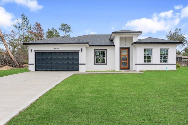 prairie-style home with an attached garage, driveway, a front lawn, and a shingled roof