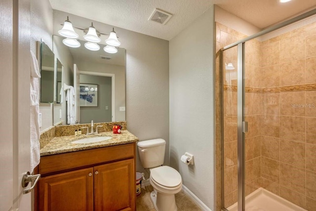 full bathroom with a stall shower, visible vents, toilet, a textured ceiling, and vanity