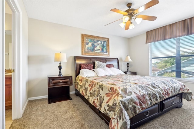 bedroom with carpet, a ceiling fan, and baseboards