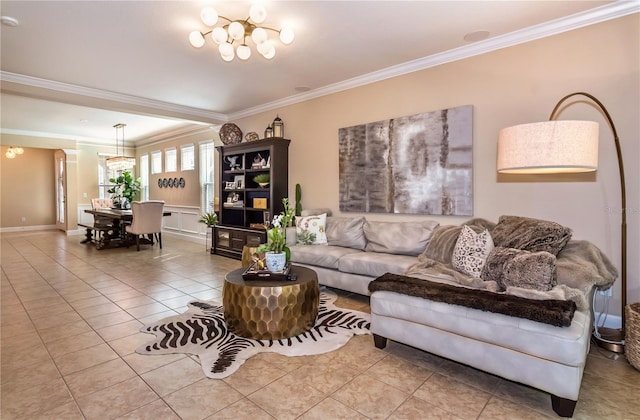 tiled living area featuring an inviting chandelier and ornamental molding