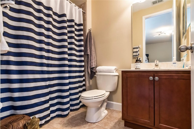 full bathroom with visible vents, toilet, a shower with curtain, tile patterned flooring, and vanity