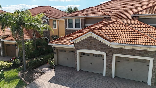 view of front of property with decorative driveway