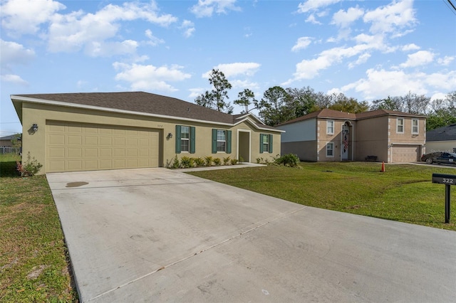 ranch-style home featuring a front yard, concrete driveway, an attached garage, and stucco siding