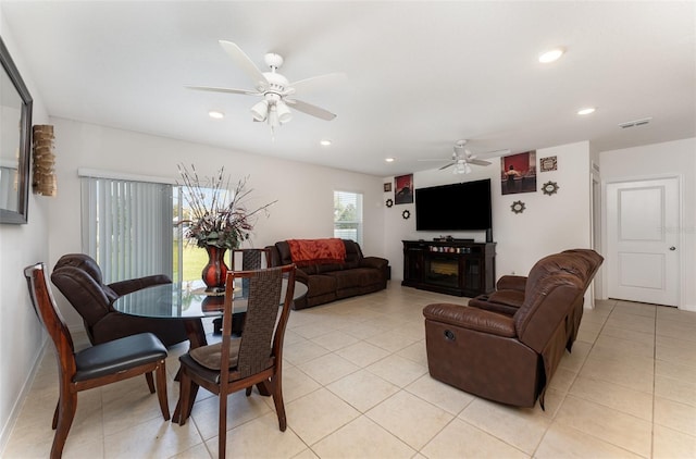 living room with recessed lighting, visible vents, ceiling fan, and light tile patterned flooring