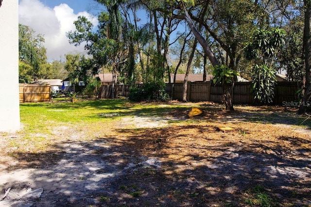 view of yard featuring fence