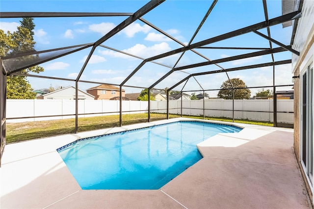 view of pool with a patio and a fenced backyard