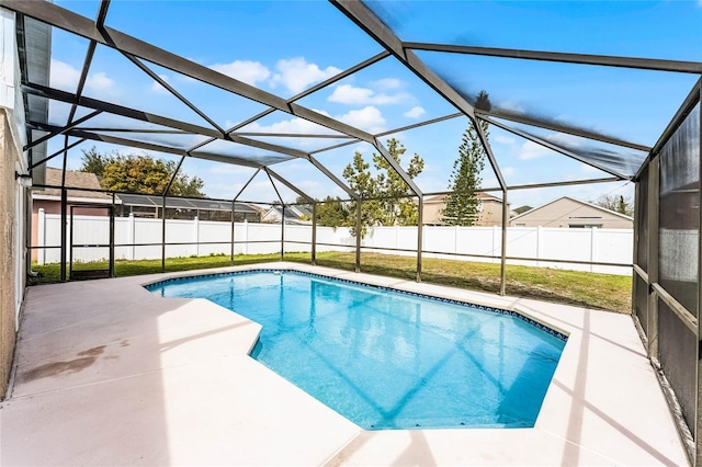 view of pool featuring a lanai, a fenced backyard, and a patio