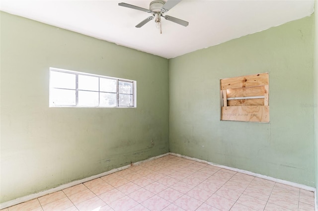 unfurnished room with ceiling fan