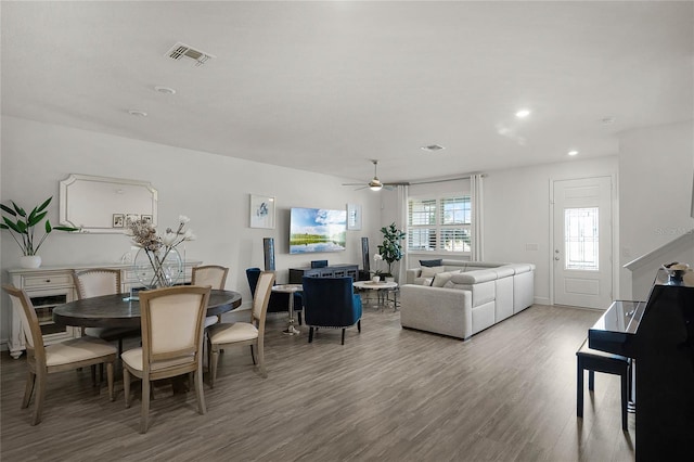 dining area featuring ceiling fan, wood finished floors, visible vents, and recessed lighting