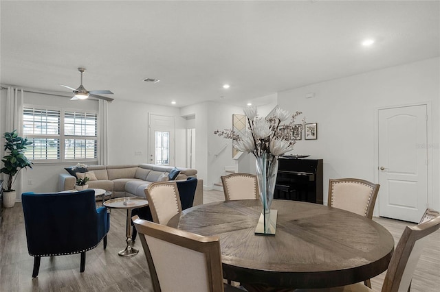 dining room with light wood-style flooring, visible vents, a ceiling fan, and recessed lighting