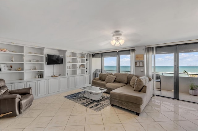 living room with light tile patterned floors and built in features