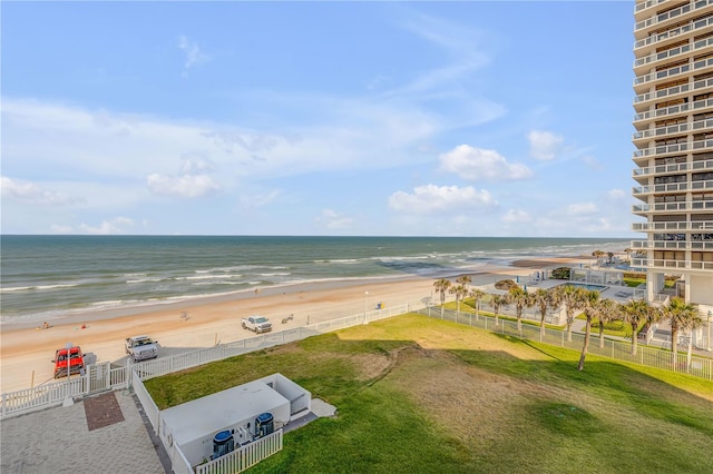 aerial view featuring a water view and a beach view