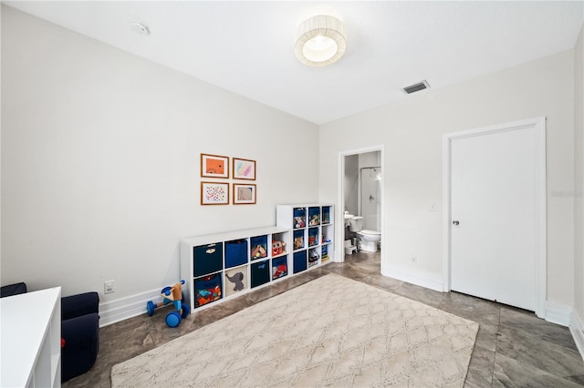 playroom with baseboards and visible vents