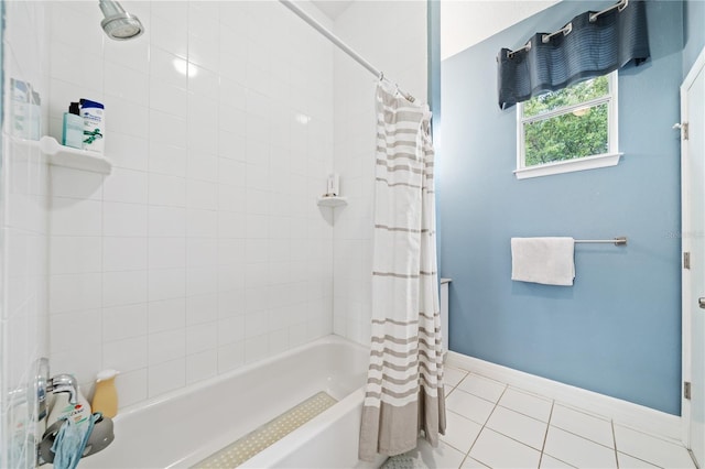 full bathroom with baseboards, shower / bathtub combination with curtain, and tile patterned floors