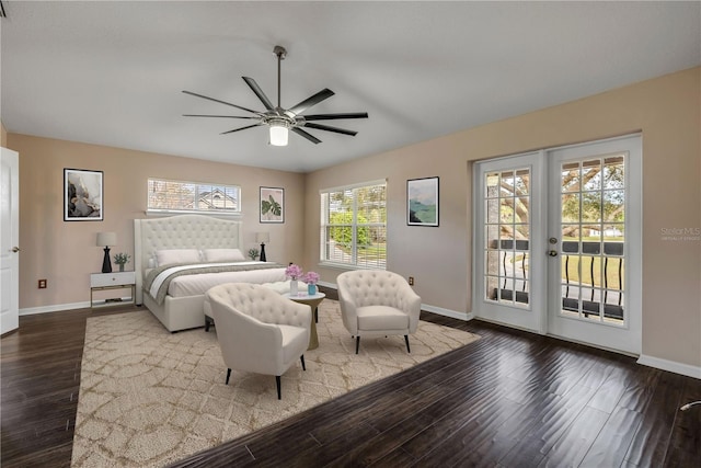 bedroom with baseboards, french doors, wood finished floors, and access to exterior