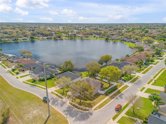 birds eye view of property featuring a water view and a residential view