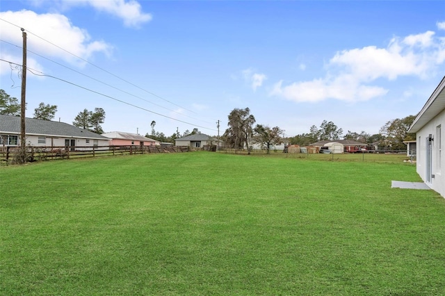 view of yard featuring fence