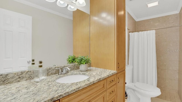 full bathroom with toilet, ornamental molding, a tile shower, and vanity