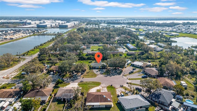 bird's eye view with a water view and a residential view