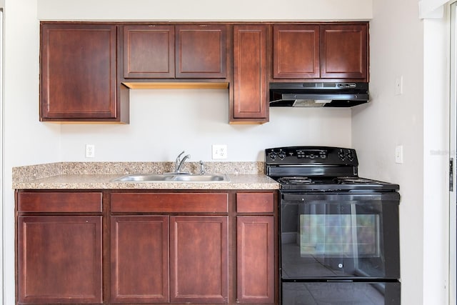 kitchen with under cabinet range hood, a sink, light countertops, dark brown cabinets, and black electric range oven