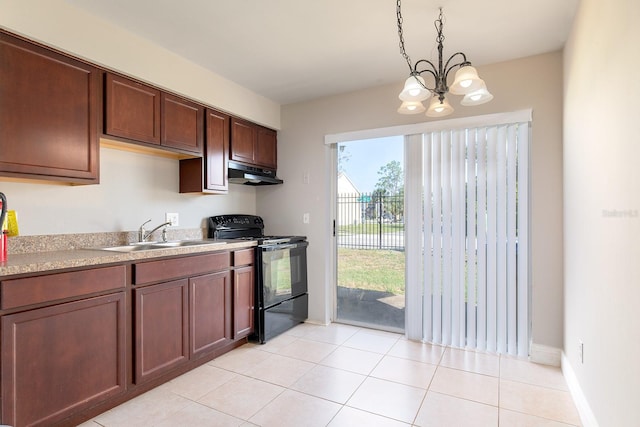 kitchen with under cabinet range hood, a sink, light countertops, black electric range oven, and decorative light fixtures