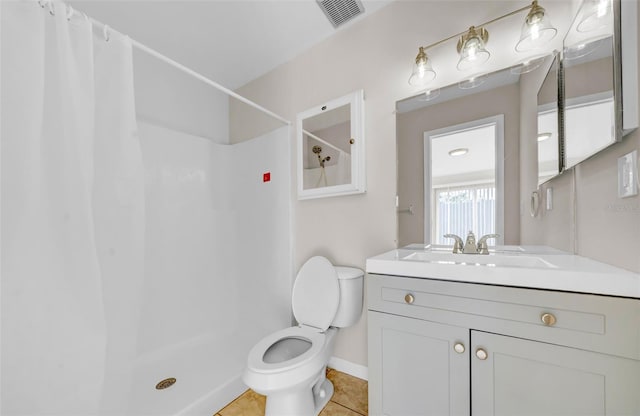 full bathroom featuring toilet, tile patterned floors, visible vents, and a shower with shower curtain