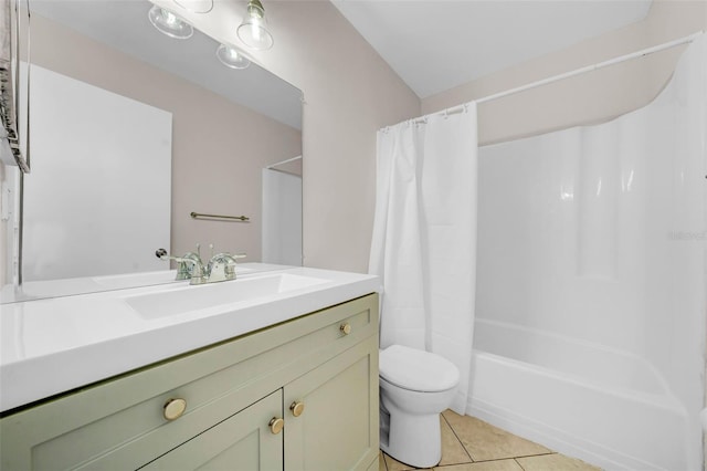 bathroom with tile patterned flooring, shower / tub combo with curtain, vanity, and toilet