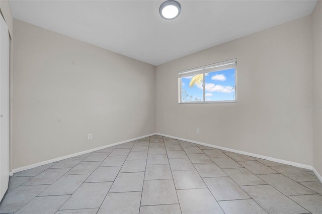 empty room with baseboards