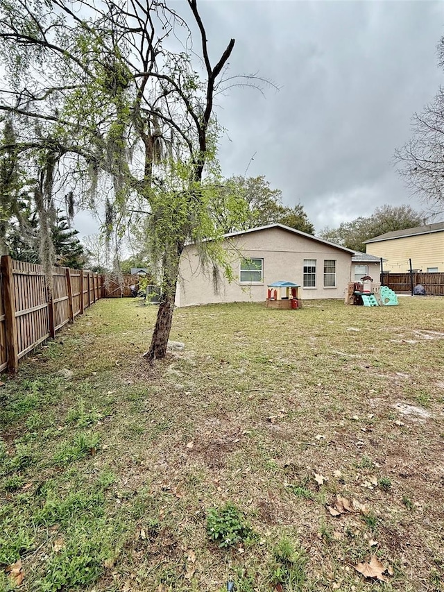 view of yard with a fenced backyard