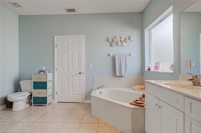 full bathroom featuring visible vents, toilet, tile patterned floors, vanity, and a bath