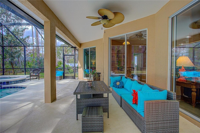 view of patio / terrace with ceiling fan, glass enclosure, an in ground hot tub, outdoor lounge area, and an outdoor pool