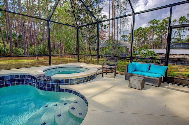 exterior space featuring a pool with connected hot tub, a lanai, and a patio