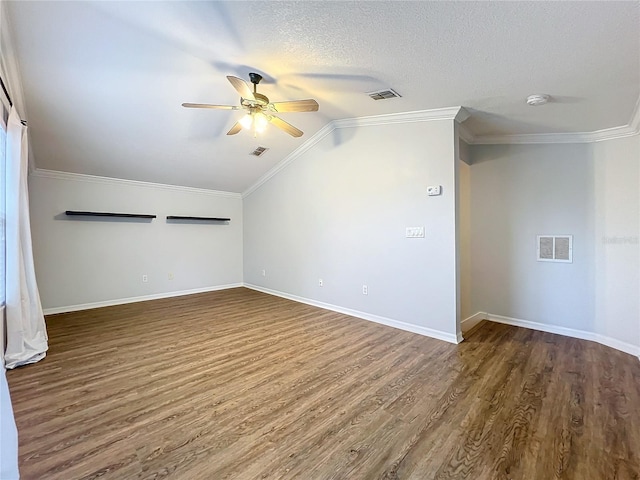 interior space featuring wood finished floors, visible vents, and a ceiling fan