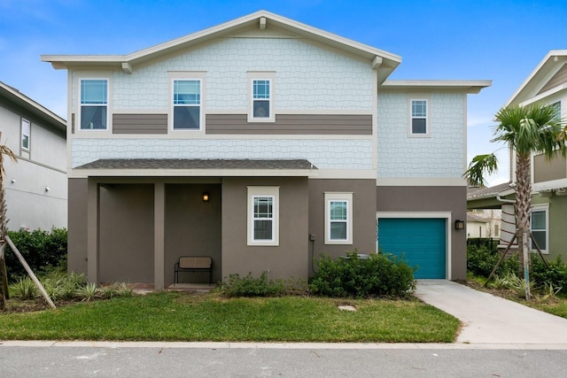 view of front of home featuring a garage, concrete driveway, and stucco siding