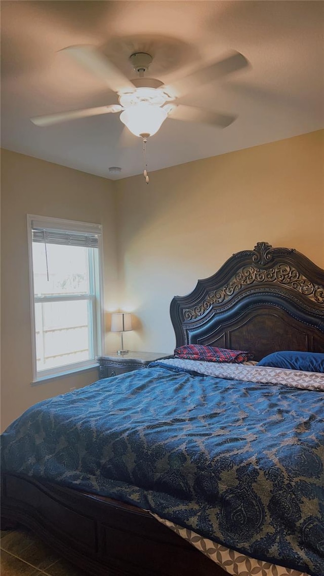 bedroom featuring ceiling fan