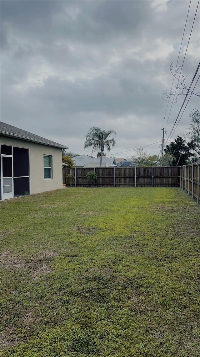 view of yard featuring a fenced backyard