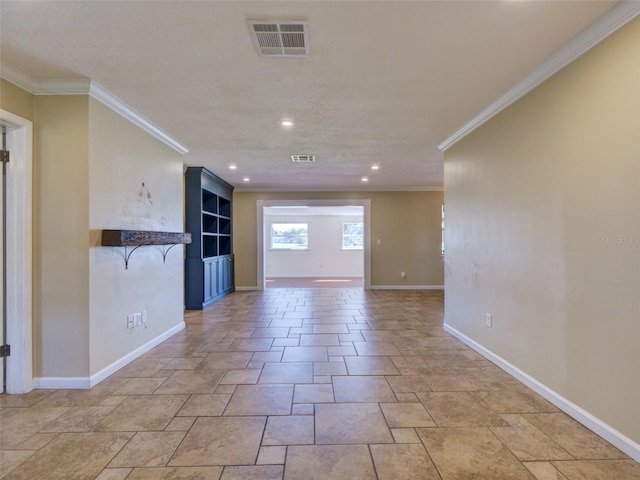 unfurnished living room with baseboards, visible vents, crown molding, and recessed lighting