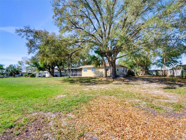 view of yard featuring fence