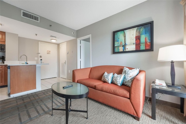 living room featuring visible vents and baseboards