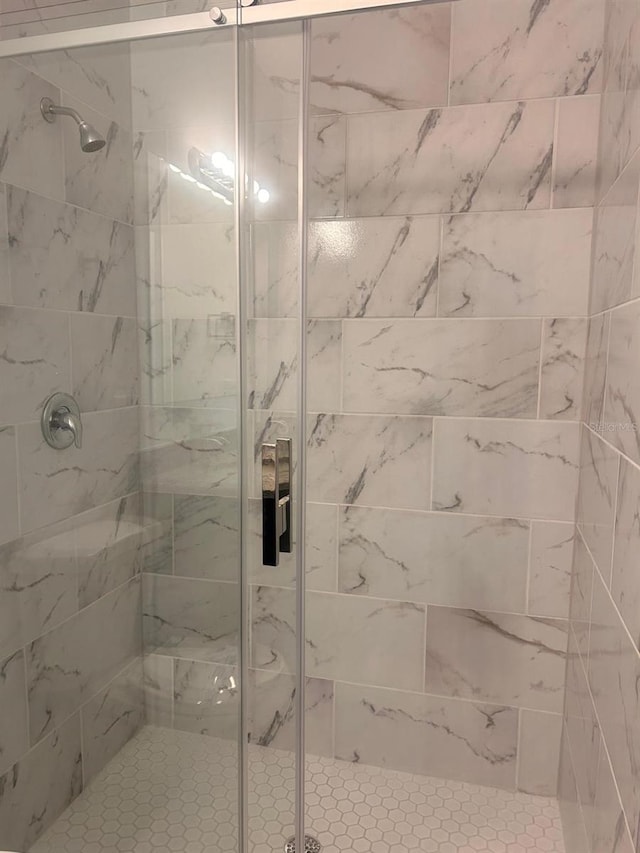 9451 N Emellia Ave, Citrus Springs, FL 34433 - bathroom featuring a shower stall