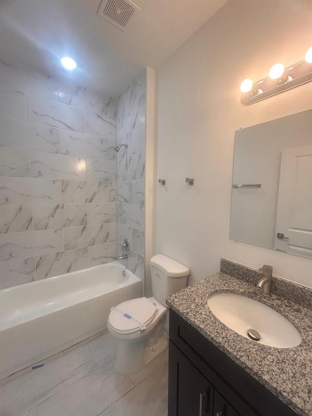 9451 N Emellia Ave, Citrus Springs, FL 34433 - full bath with vanity, toilet, marble finish flooring, and shower / bath combination