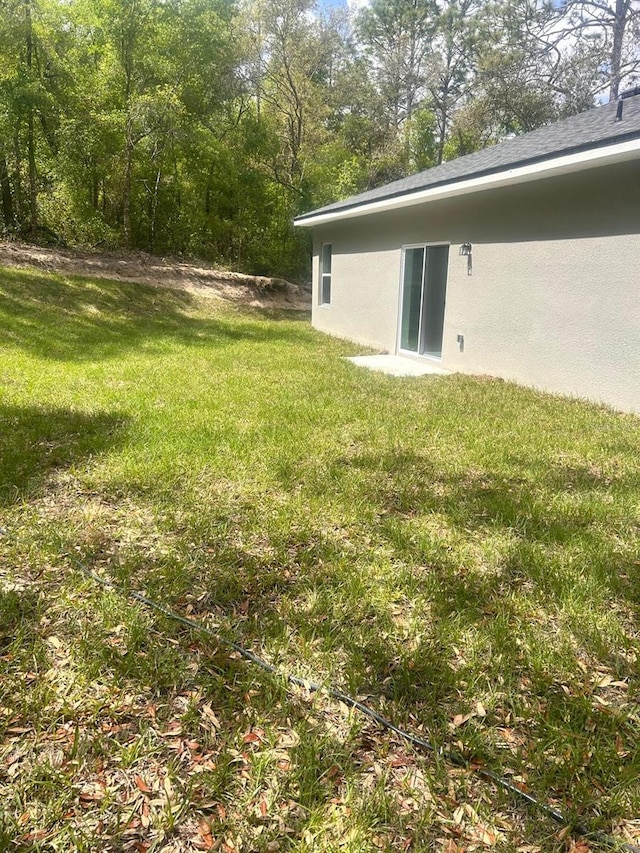 9451 N Emellia Ave, Citrus Springs, FL 34433 - view of green lawn