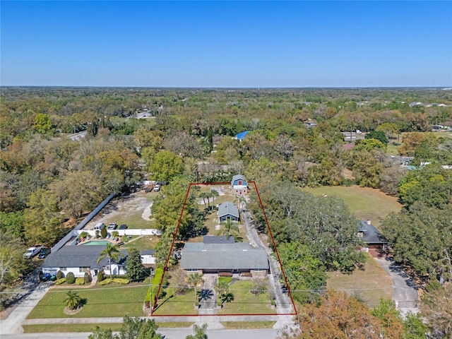 aerial view featuring a view of trees