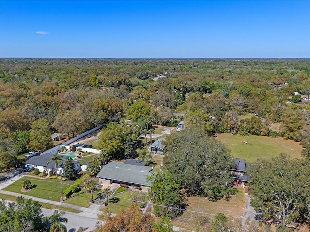 aerial view featuring a forest view