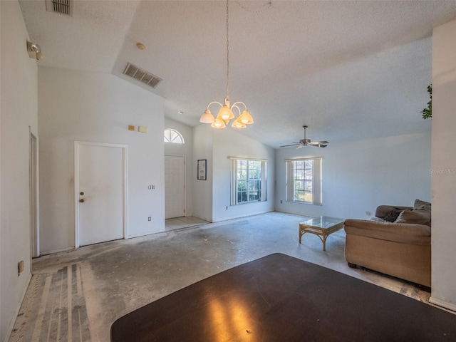 living area featuring high vaulted ceiling, visible vents, a textured ceiling, and ceiling fan with notable chandelier